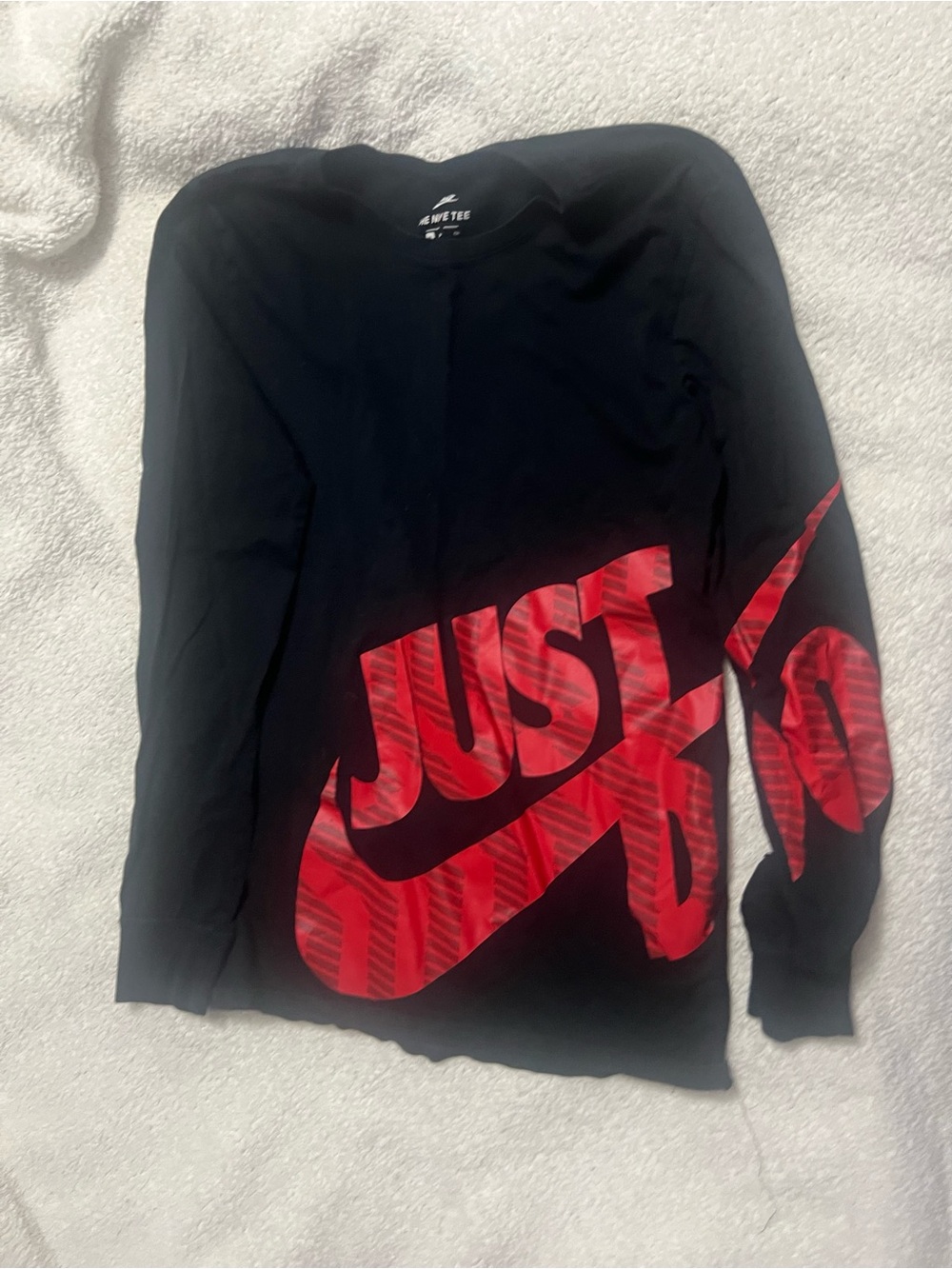 Nike Black Long-Sleeve Tee with Red 'Just Do It' Graphic